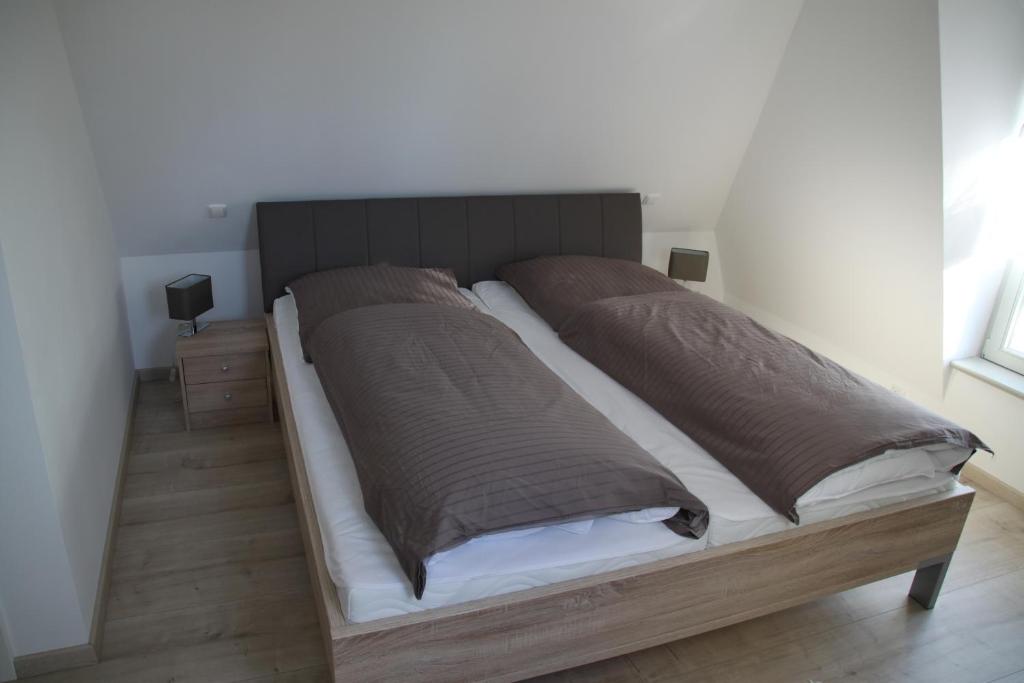 Postel nebo postele na pokoji v ubytování Ferienwohnung am Elbdeich
