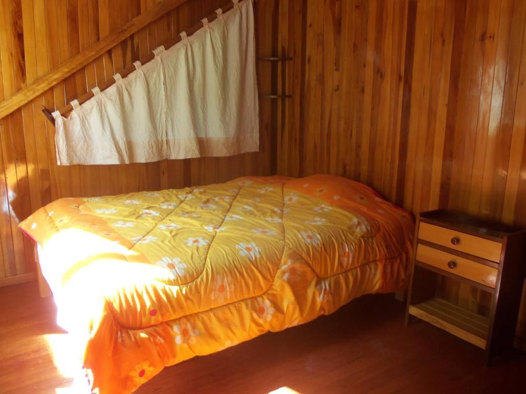 Postel nebo postele na pokoji v ubytování Refugio de Orquídeas