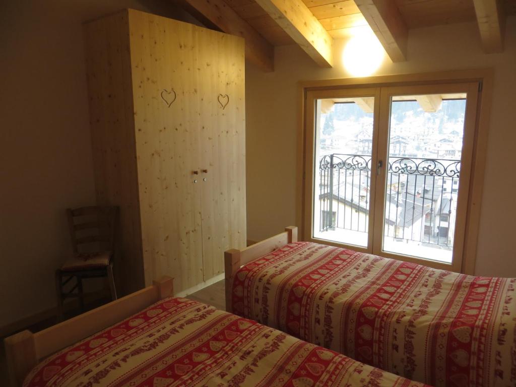 A bed or beds in a room at Olimpic Hostel