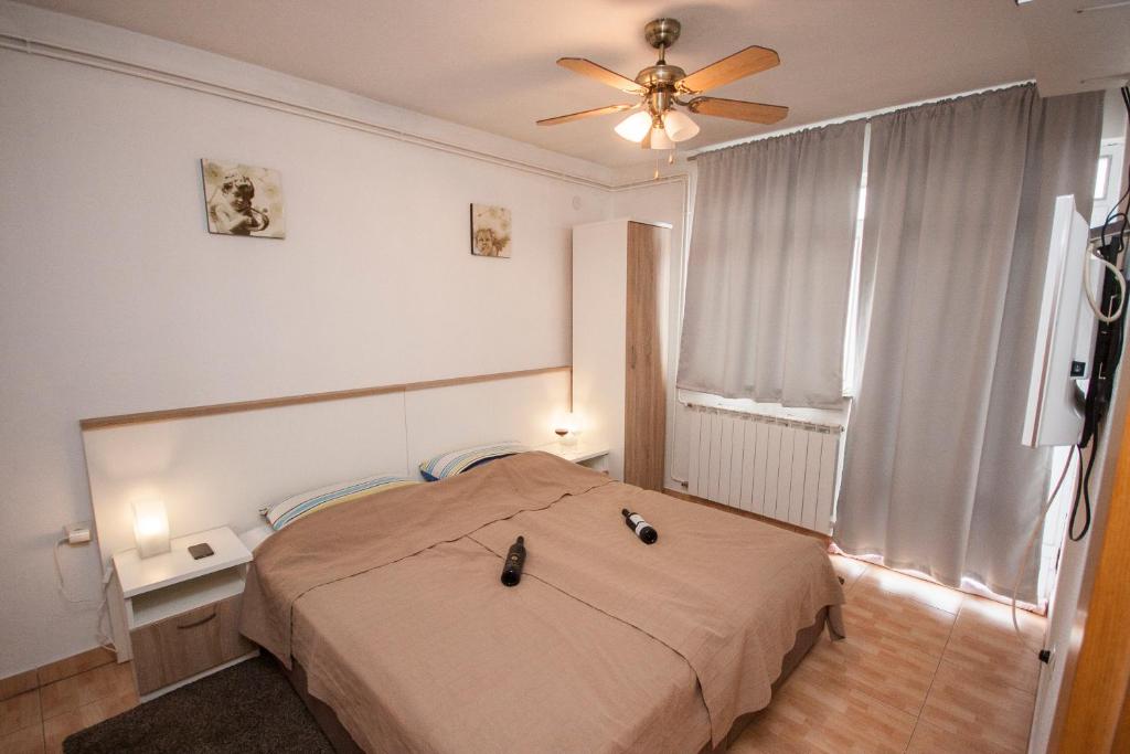 Posteľ alebo postele v izbe v ubytovaní Apartment Karlovac