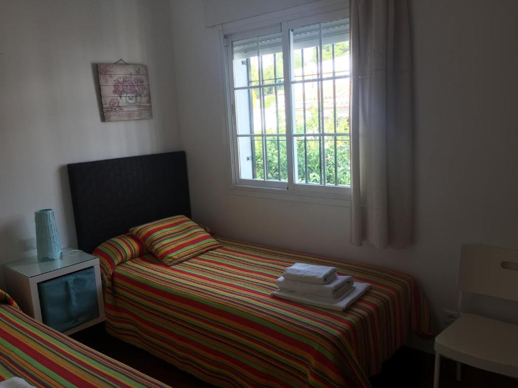Posteľ alebo postele v izbe v ubytovaní Apartamentos Luna de Nerja