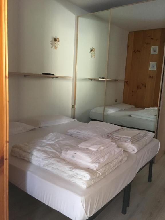 Postel nebo postele na pokoji v ubytování El Ladinia Someda