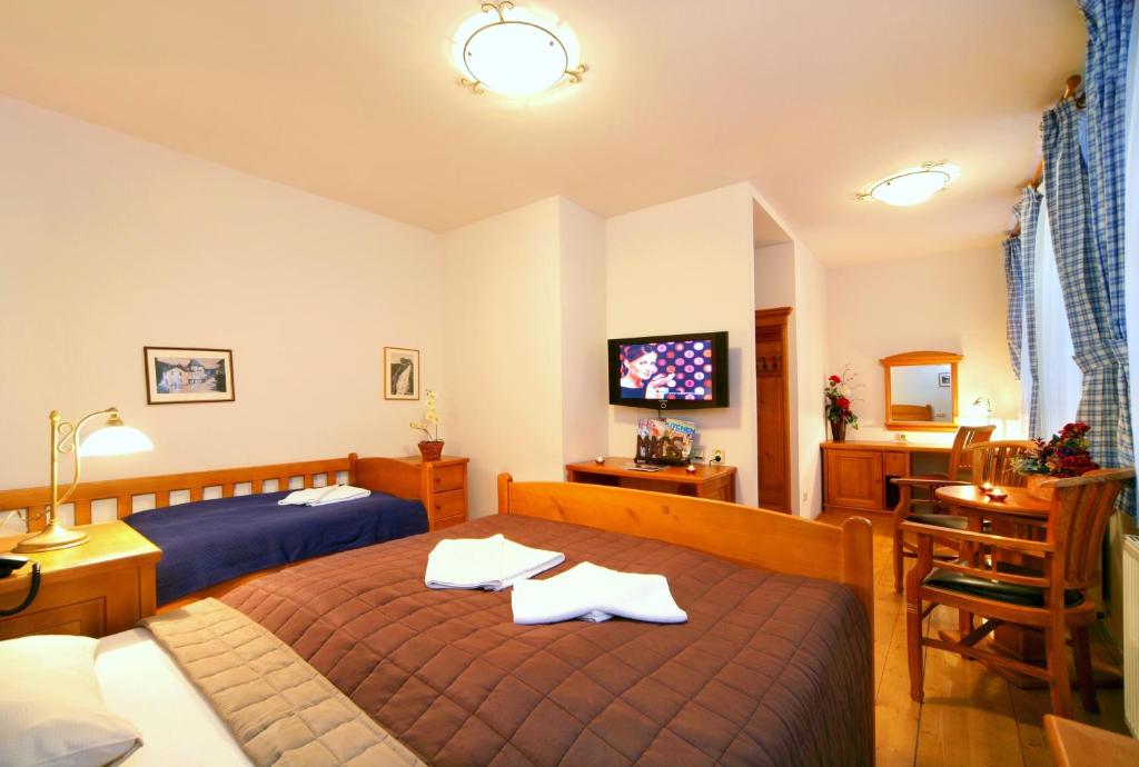 Postel nebo postele na pokoji v ubytování Hotel pizzeria Belmonte