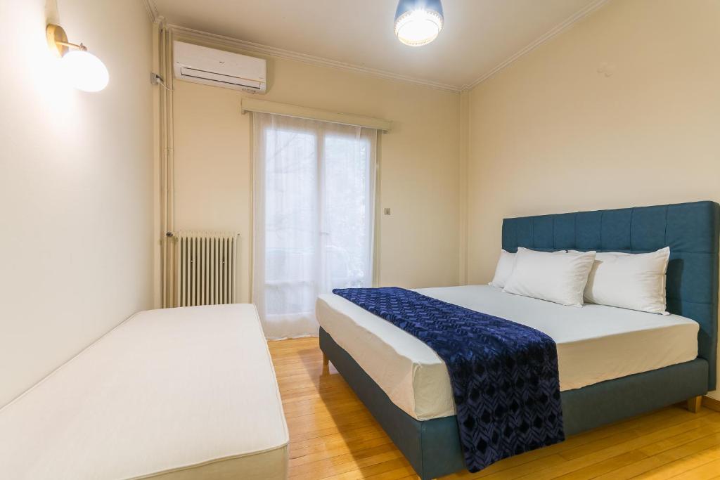 Postel nebo postele na pokoji v ubytování Victoria Queens Paradise Apartments