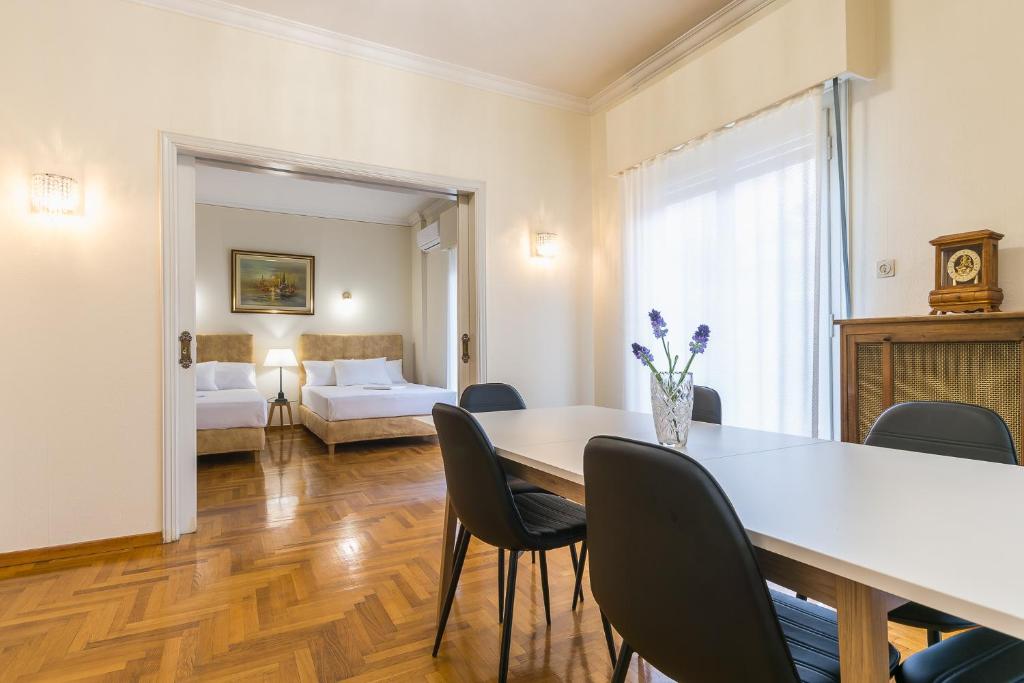 Postel nebo postele na pokoji v ubytování Victoria Queens Paradise Apartments
