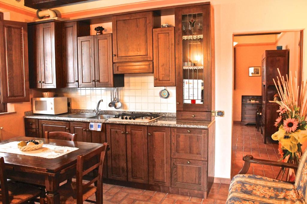 Kuchyň nebo kuchyňský kout v ubytování Agriturismo Sanguineto