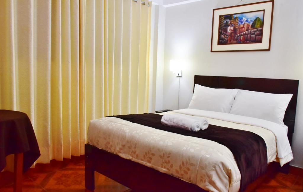 Postel nebo postele na pokoji v ubytování Machupicchu Guest House