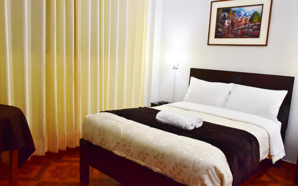 Postel nebo postele na pokoji v ubytování Machupicchu Guest House