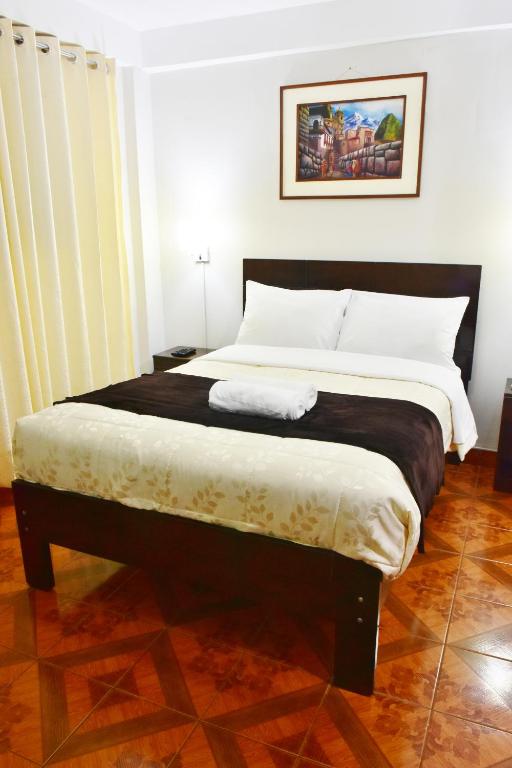 Postel nebo postele na pokoji v ubytování Machupicchu Guest House