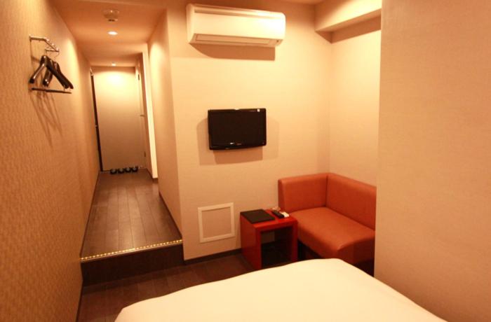 TV a/nebo společenská místnost v ubytování Hills Hotel Gotanda
