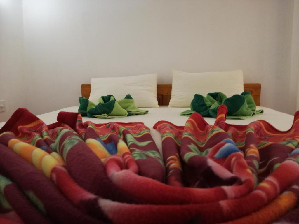 Postel nebo postele na pokoji v ubytování Ella Sunrise