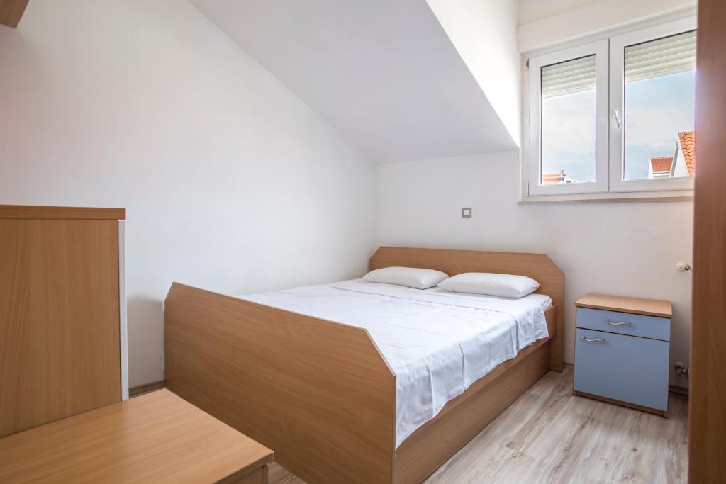 Posteľ alebo postele v izbe v ubytovaní Apartment Alduk