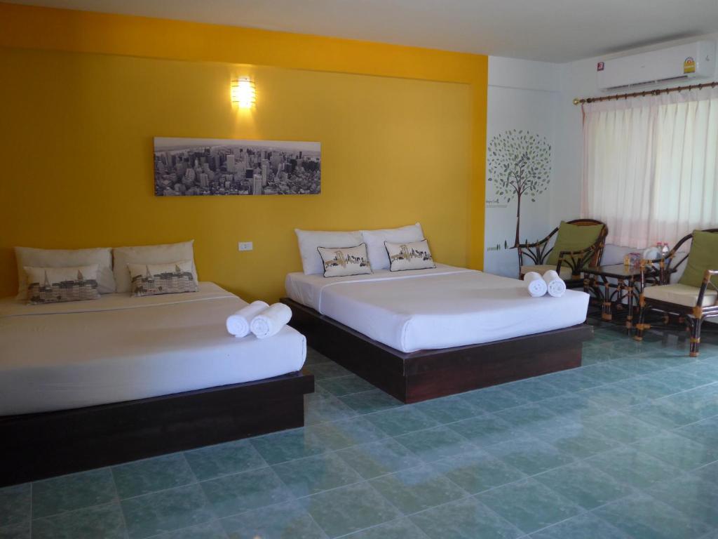 Postel nebo postele na pokoji v ubytování Forum House Hotel Krabi