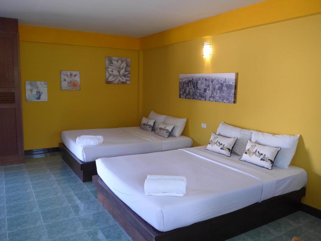 Postel nebo postele na pokoji v ubytování Forum House Hotel Krabi