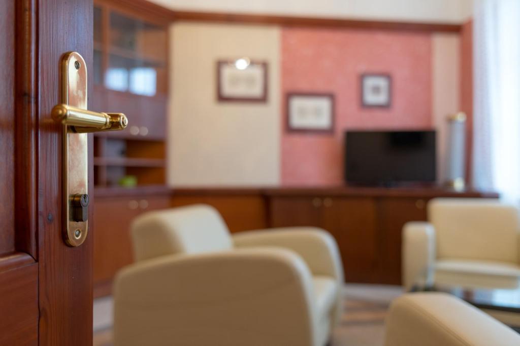 TV a/nebo společenská místnost v ubytování Pension Ibérica