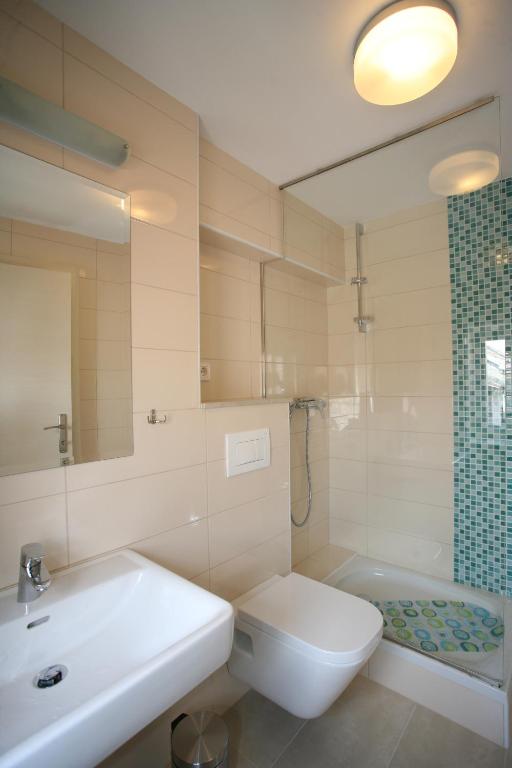 Koupelna v ubytování Rooms Beljan