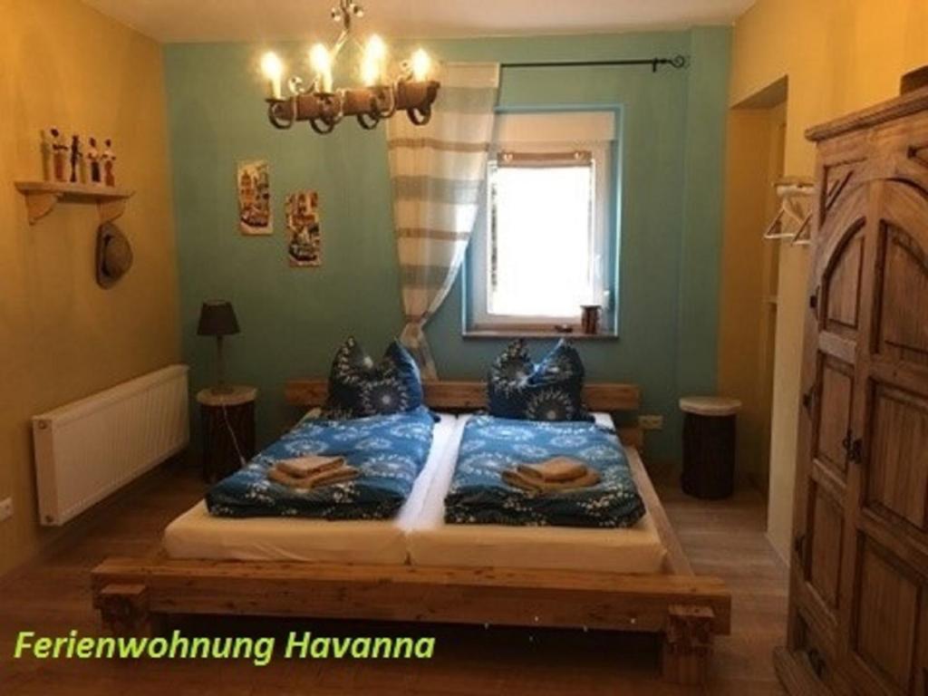 Postel nebo postele na pokoji v ubytování Pension Cubana