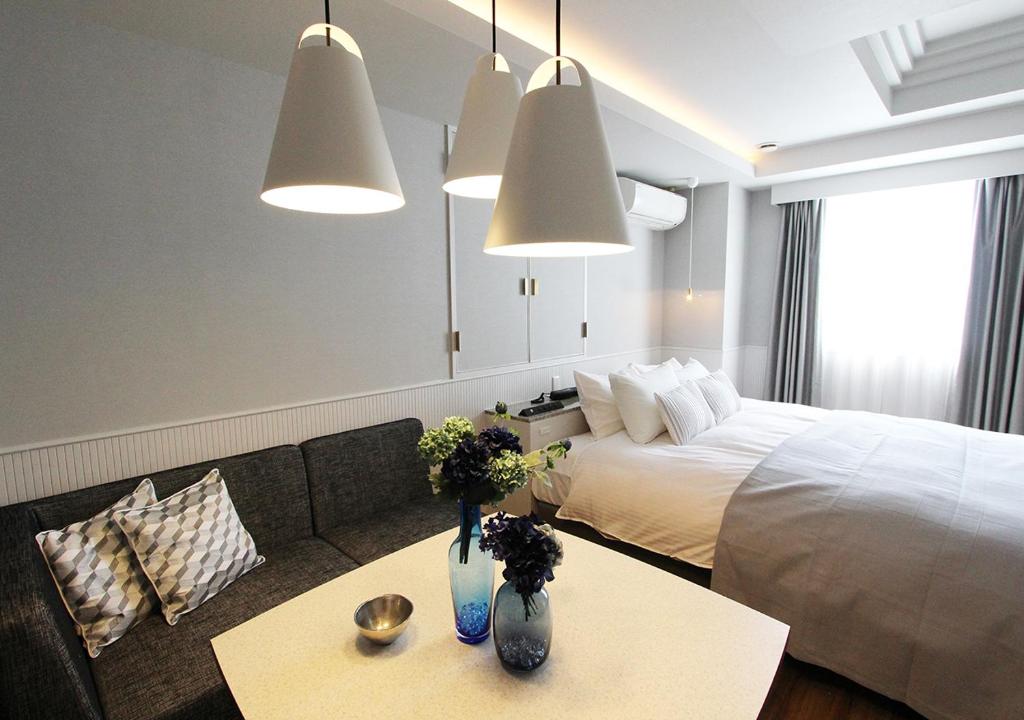 Postel nebo postele na pokoji v ubytování Hotel neobibi (Adult Only)