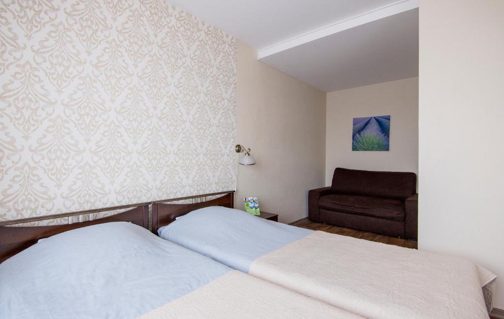 Postel nebo postele na pokoji v ubytování Hotel Mezaparks