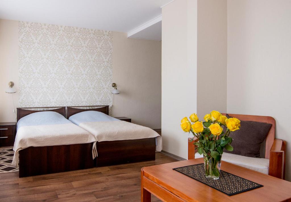 Postel nebo postele na pokoji v ubytování Hotel Mezaparks