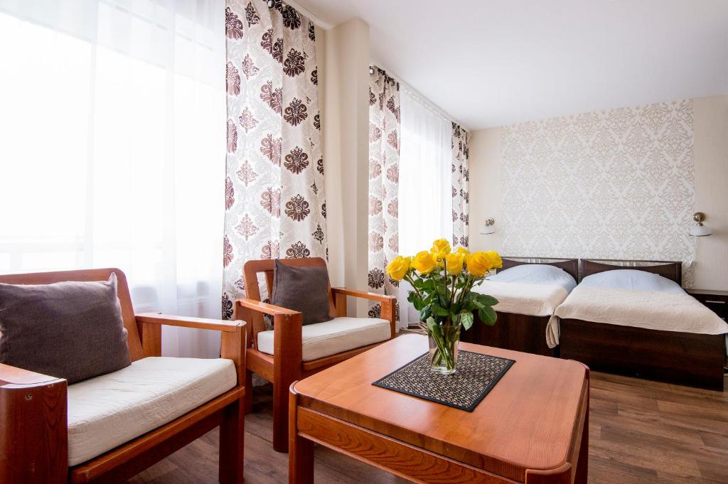Postel nebo postele na pokoji v ubytování Hotel Mezaparks