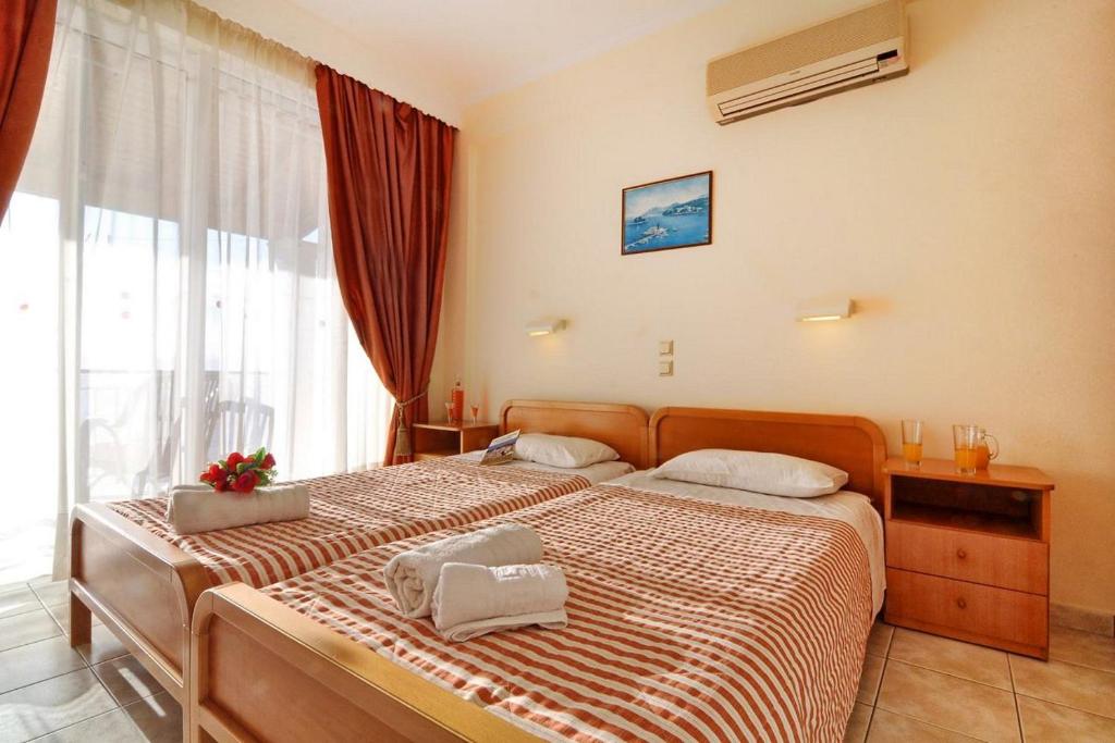 Postel nebo postele na pokoji v ubytování Lido Sofia Holidays