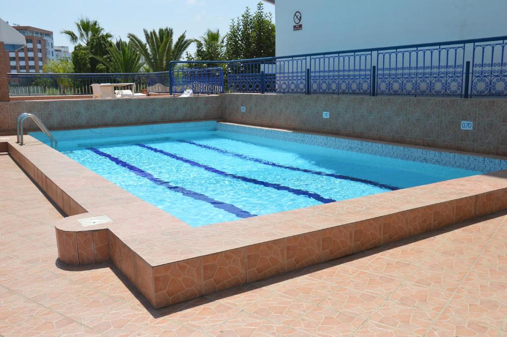 Bazén v ubytování Residence Yasmina Agadir nebo v jeho okolí