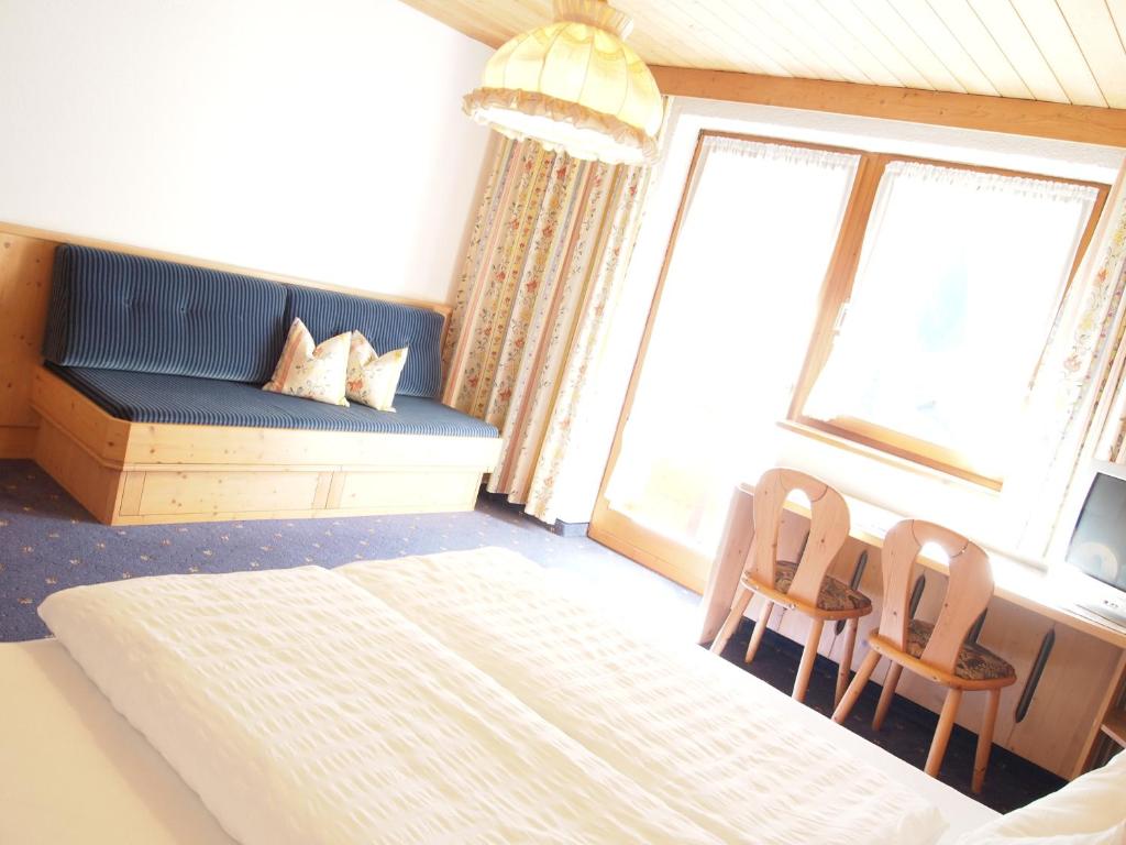Postel nebo postele na pokoji v ubytování Ferienhaus Waldner
