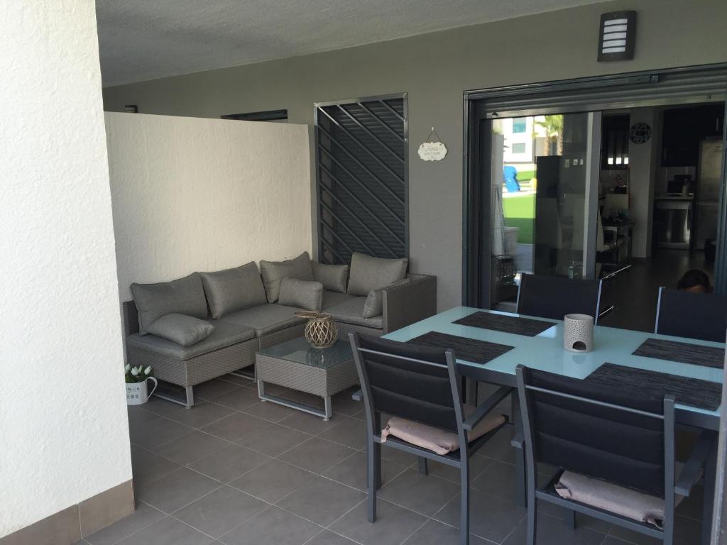 Posezení v ubytování Apartment OasisBeach La Zenia