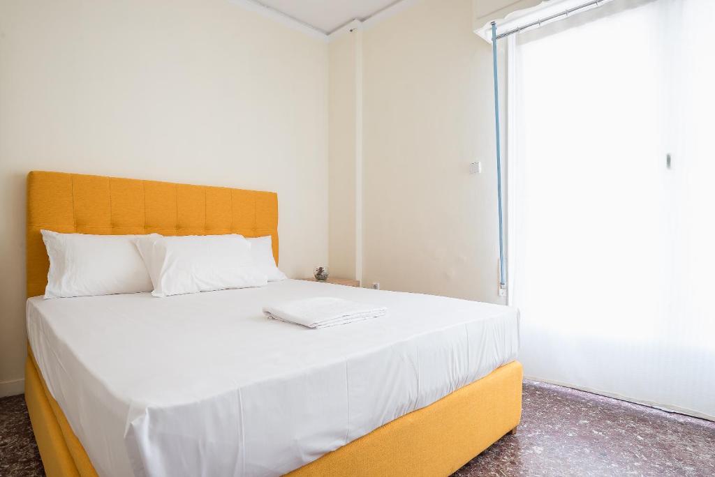 Posteľ alebo postele v izbe v ubytovaní Acropolis View Paradise Apartments