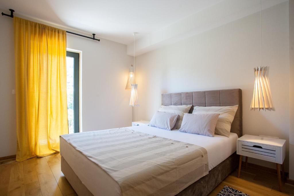 Posteľ alebo postele v izbe v ubytovaní Bella Vista Suites
