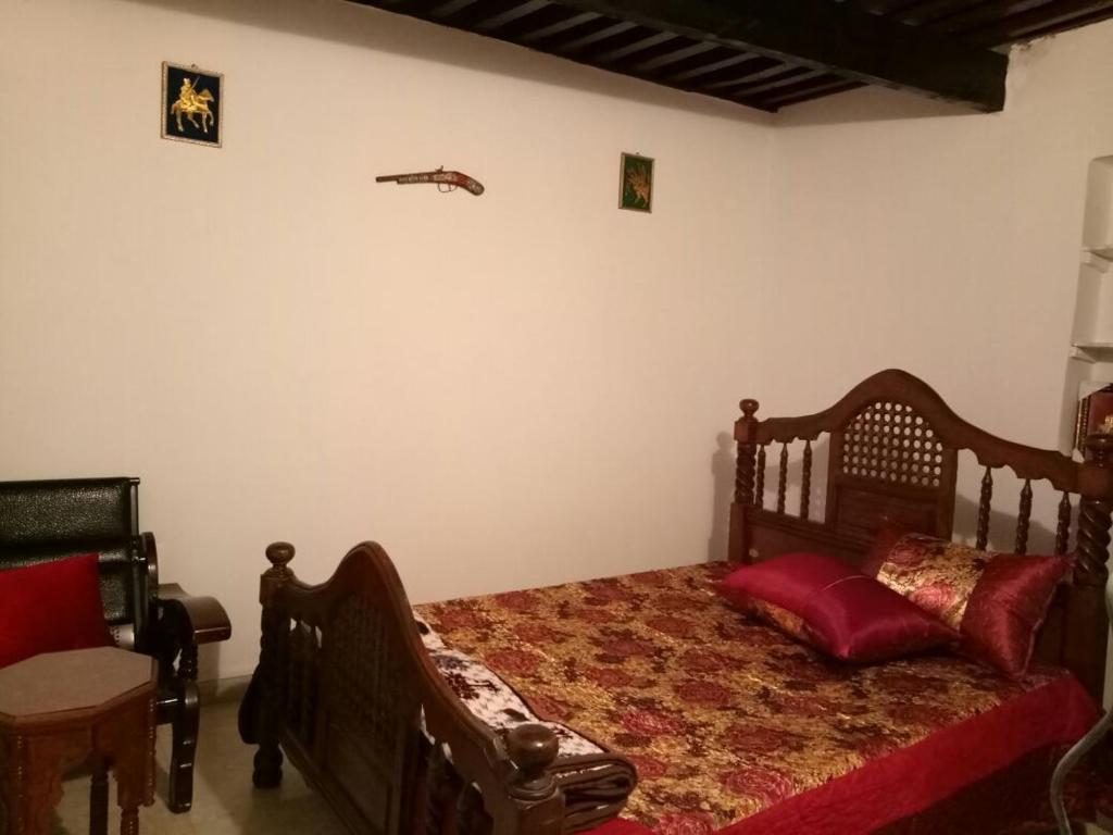 Postel nebo postele na pokoji v ubytování Dar Tsouli