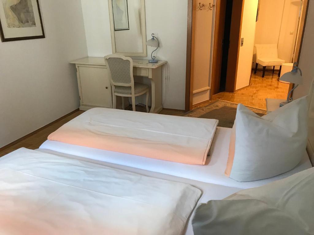 Postel nebo postele na pokoji v ubytování Hotel Schwanen