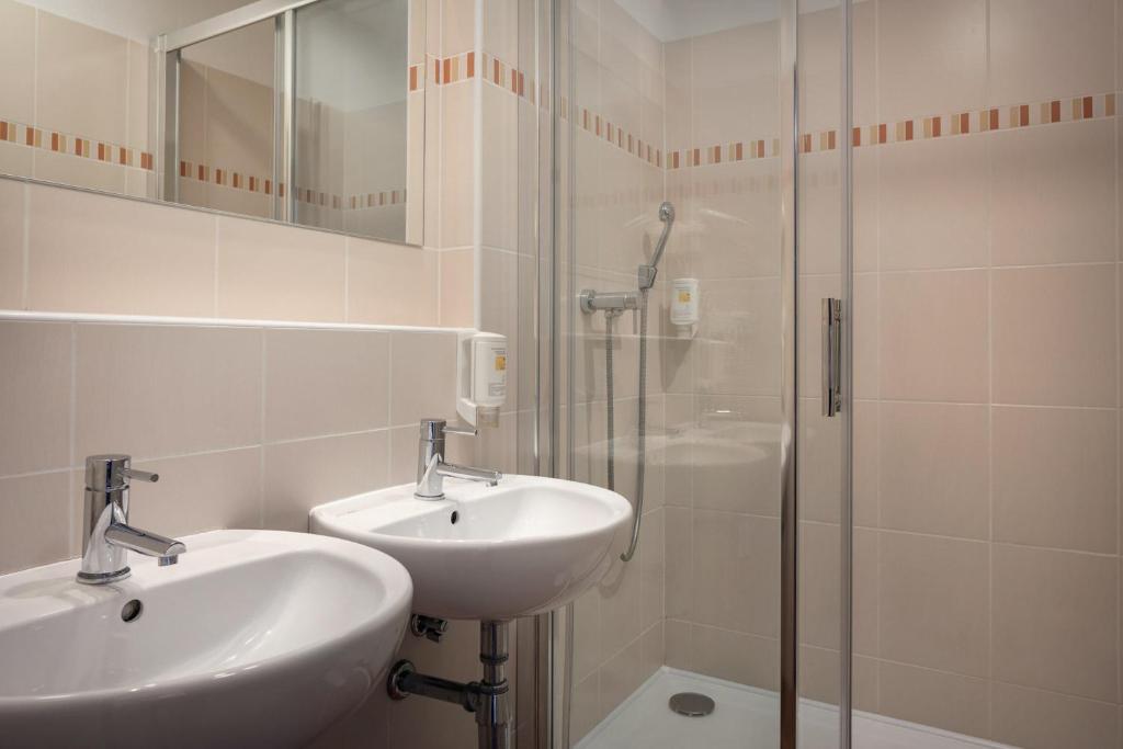 Koupelna v ubytování Congress & Wellness Hotel Olsanka