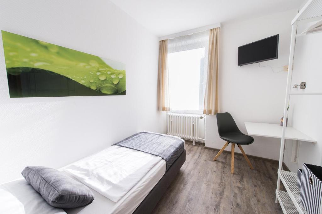 TV a/nebo společenská místnost v ubytování SOVA Hotel