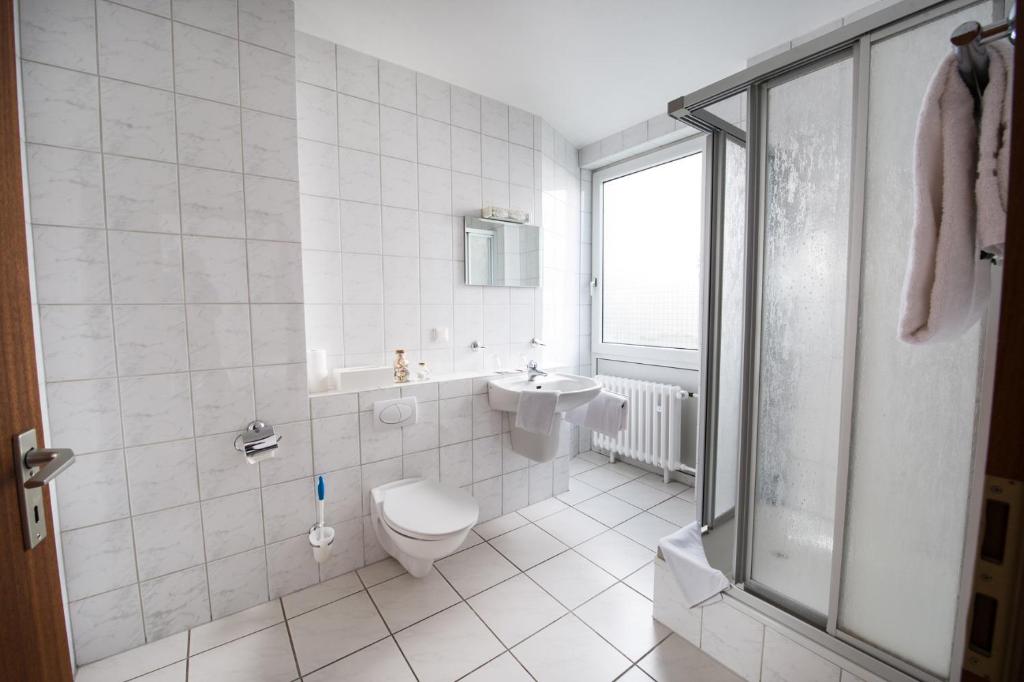 Koupelna v ubytování SOVA Hotel