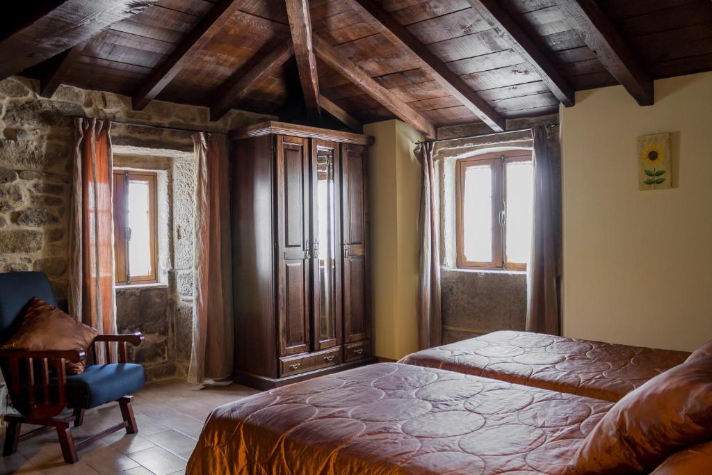 A bed or beds in a room at Casa Roan y Casa Grande