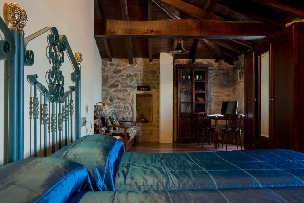 A bed or beds in a room at Casa Roan y Casa Grande