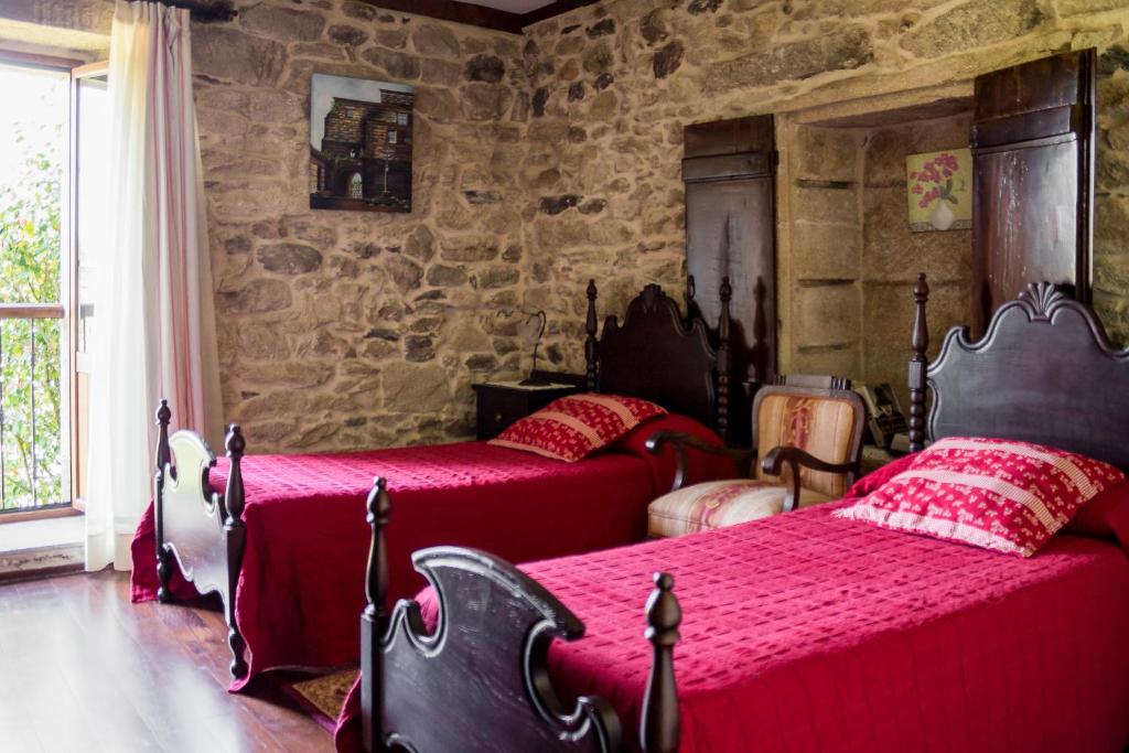 A bed or beds in a room at Casa Roan y Casa Grande