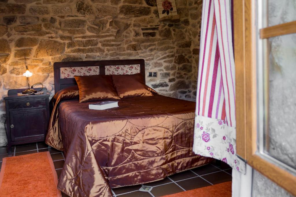 A bed or beds in a room at Casa Roan y Casa Grande