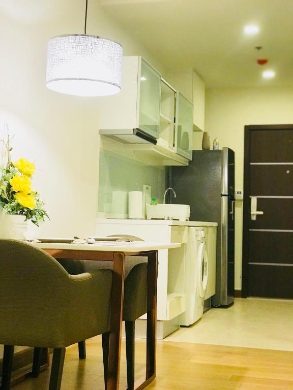 Kuchyň nebo kuchyňský kout v ubytování Astra Suites Central