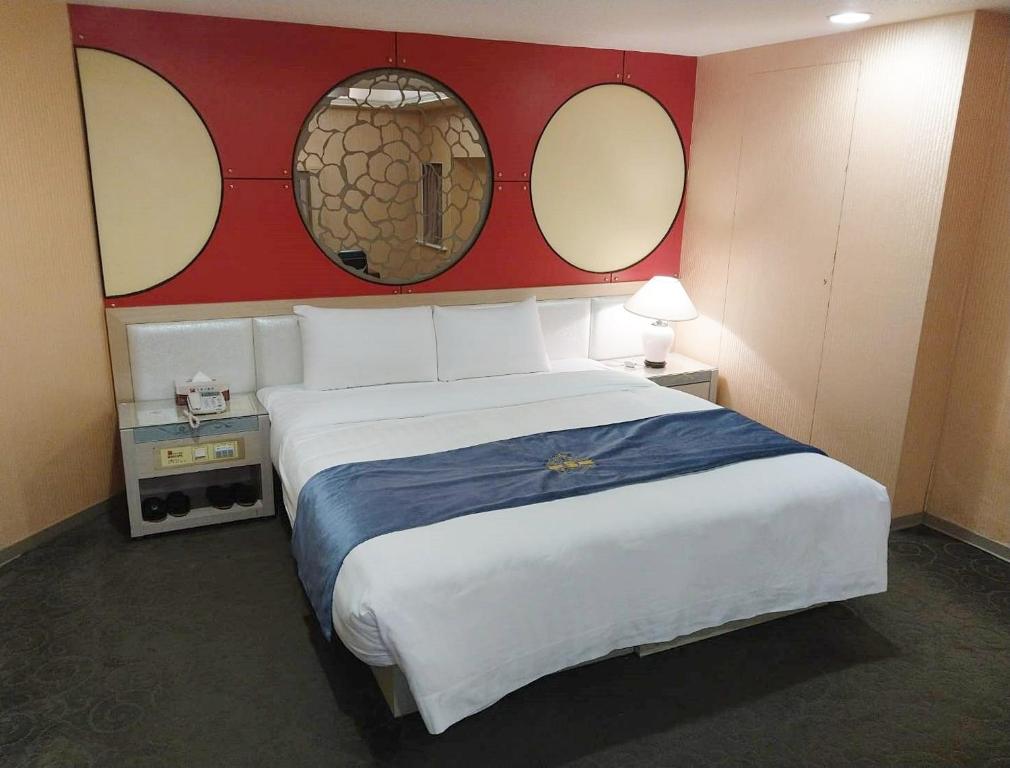 Postel nebo postele na pokoji v ubytování Beidoo Hotel