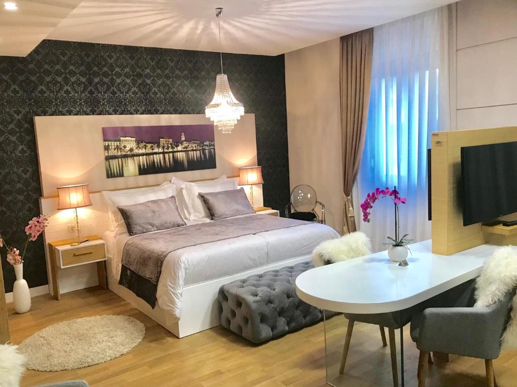 Postel nebo postele na pokoji v ubytování VIP Rooms