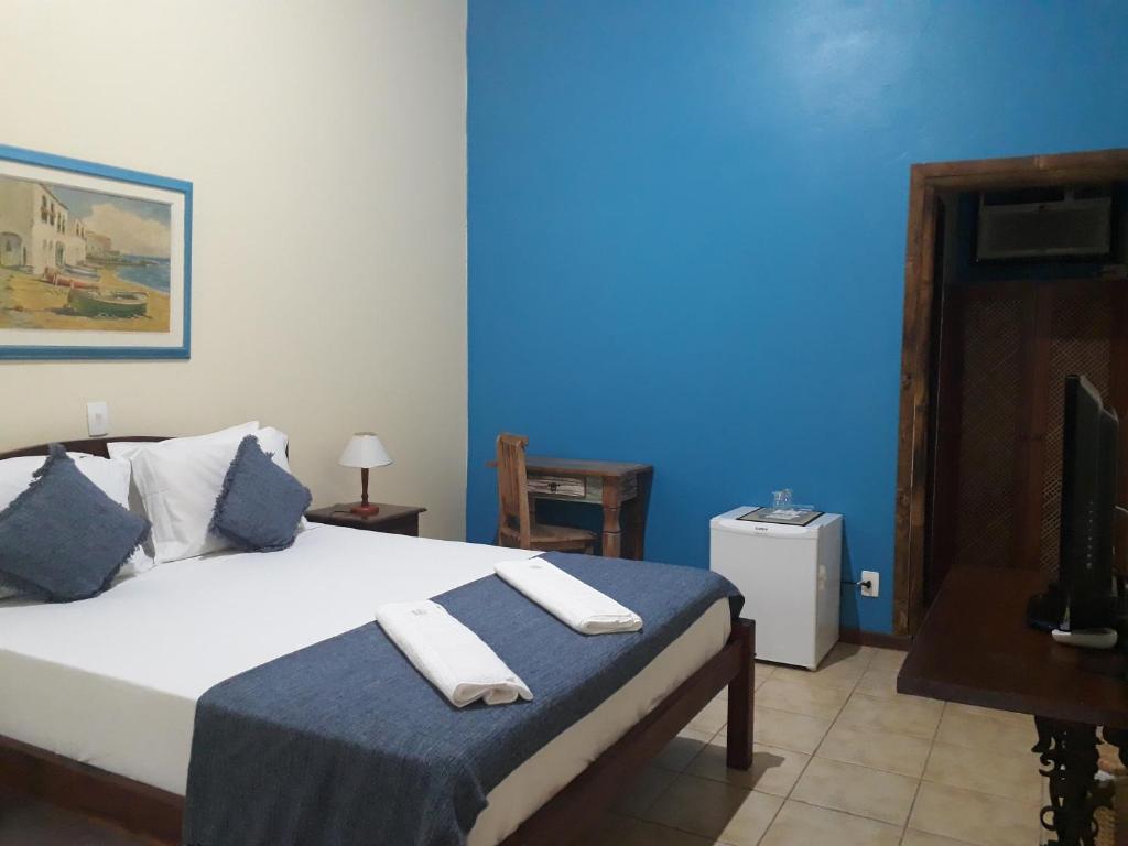 Postel nebo postele na pokoji v ubytování Pousada da Terra Paraty