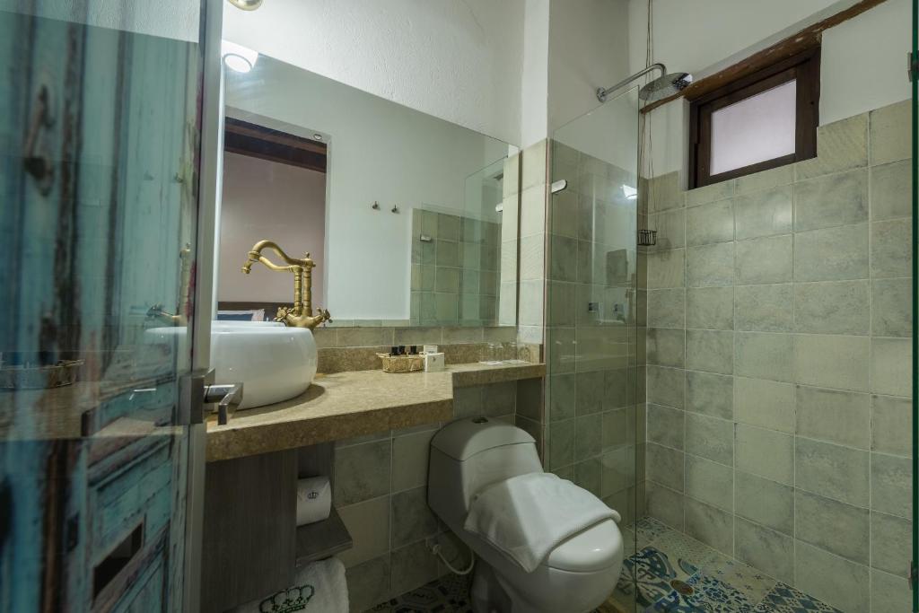 Koupelna v ubytování Getsemani Cartagena Hotel