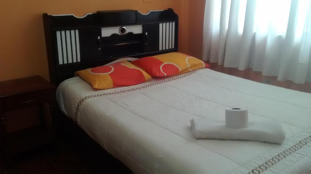 Postel nebo postele na pokoji v ubytování Nery Lodging