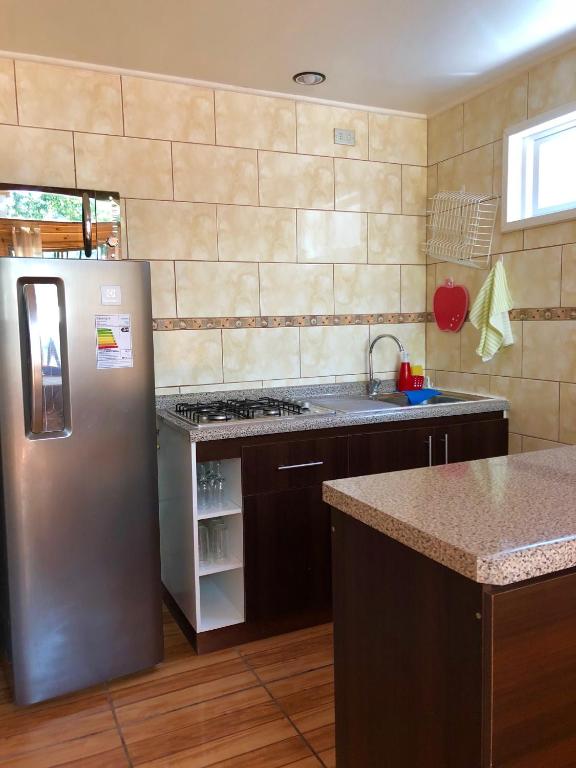 Kuchyň nebo kuchyňský kout v ubytování Cabañas Los Laureles - Lican Ray