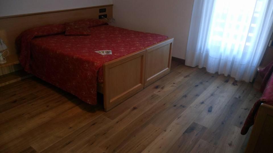 Postel nebo postele na pokoji v ubytování Meublè Rosalpina