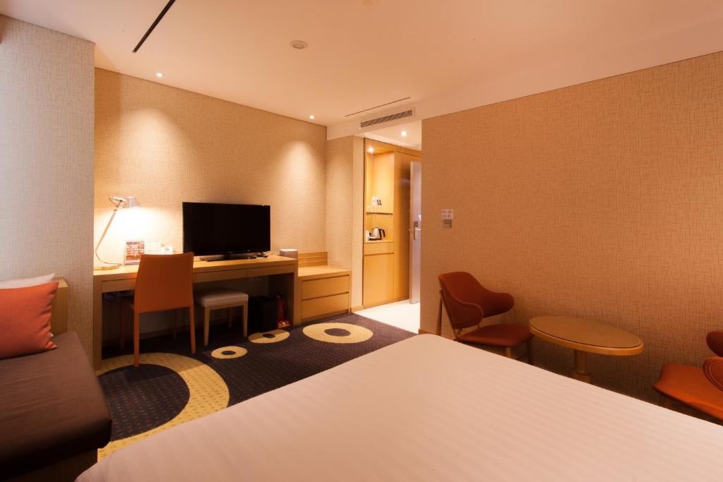 TV a/nebo společenská místnost v ubytování Solaria Nishitetsu Hotel Busan