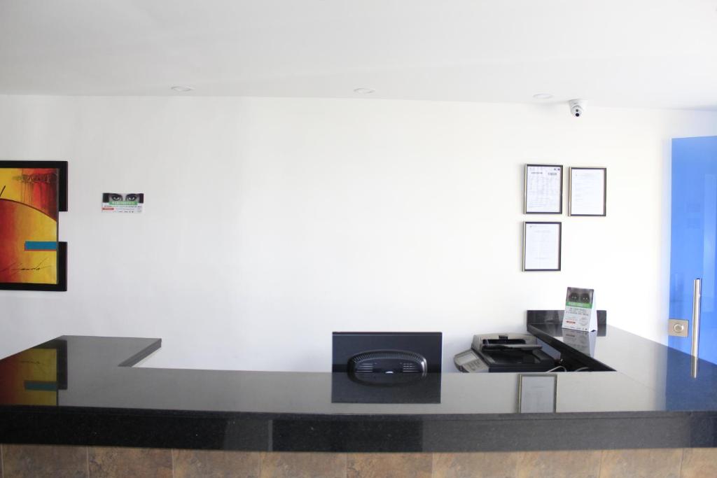 Kuchyň nebo kuchyňský kout v ubytování Hotel Pereira 421